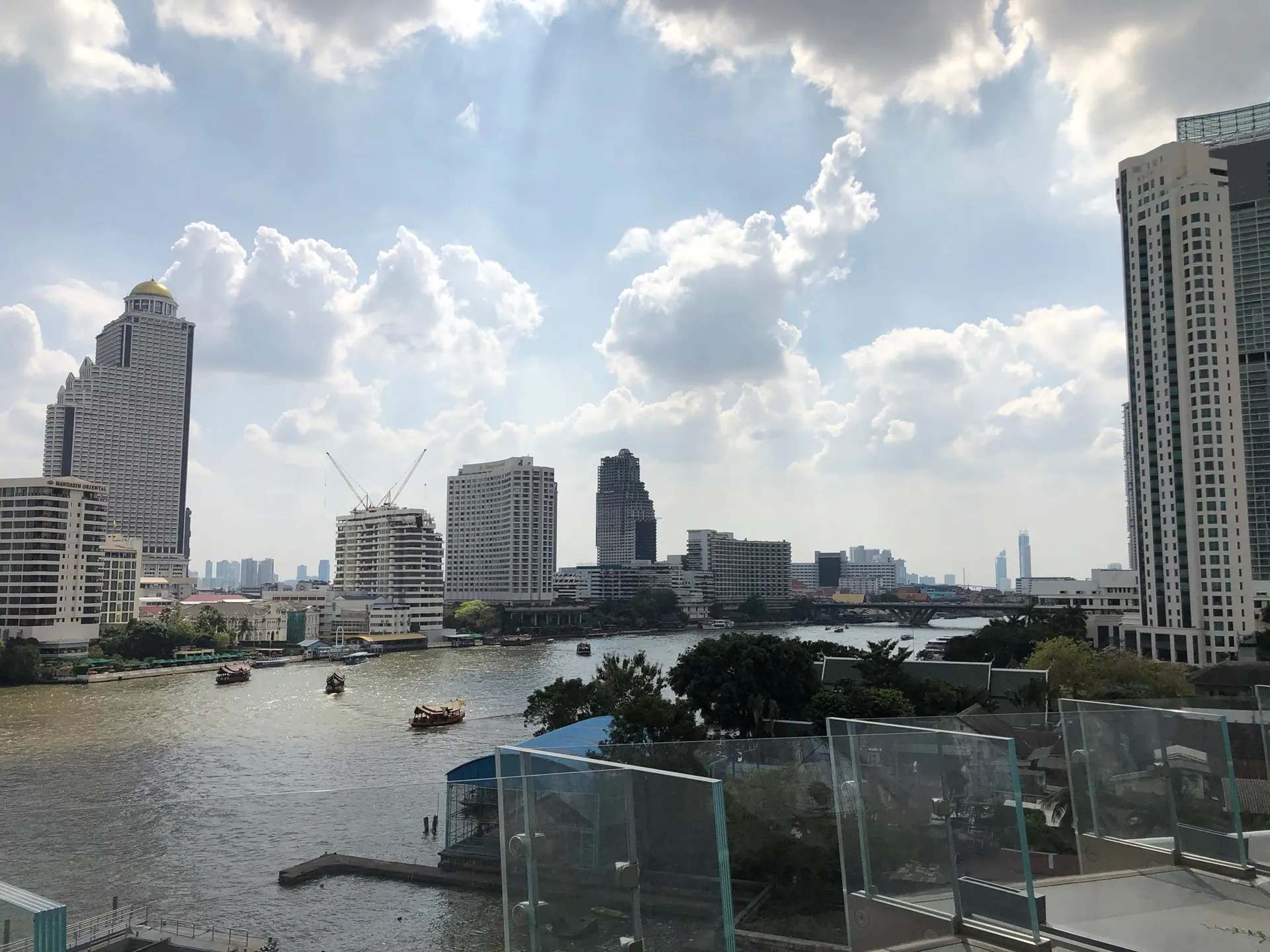 The Chao Phraya River and the city skyline seen from the ICONSIAM riverside