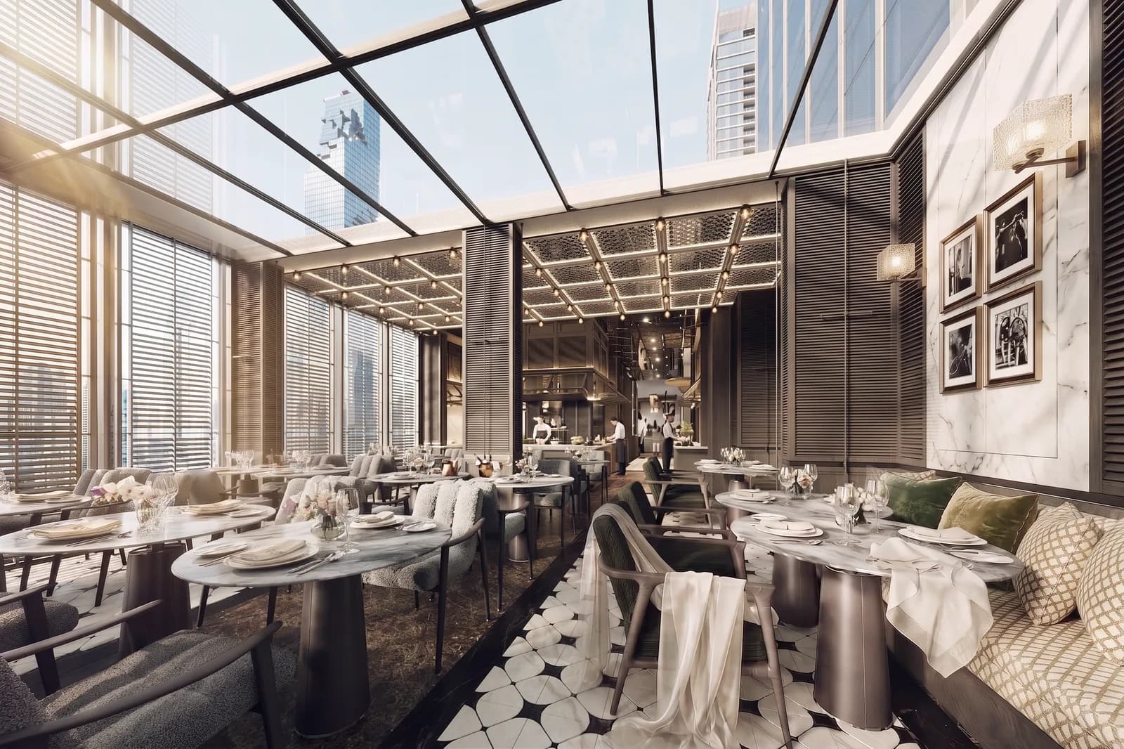 Dining area beneath a glazed roof with banquette seating and city towers visible outside